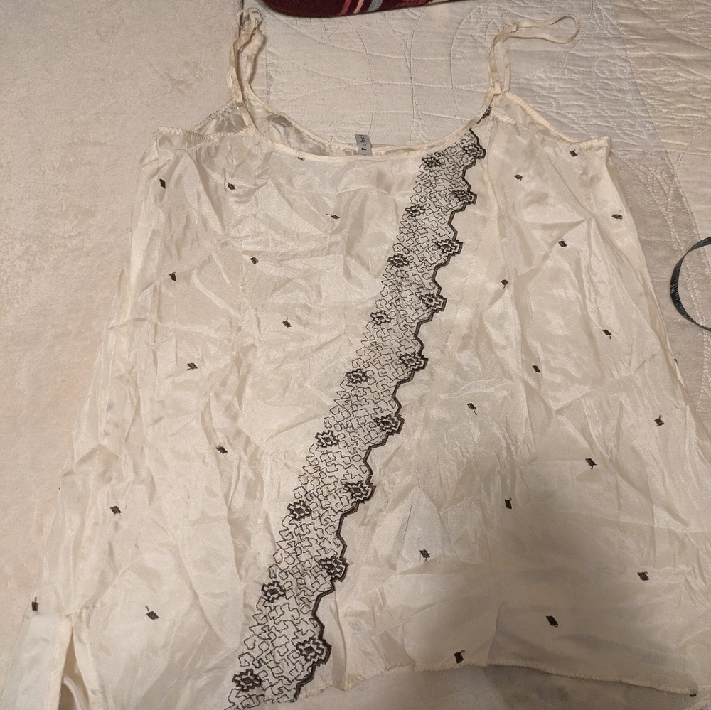 White Top With Embroidery Details
